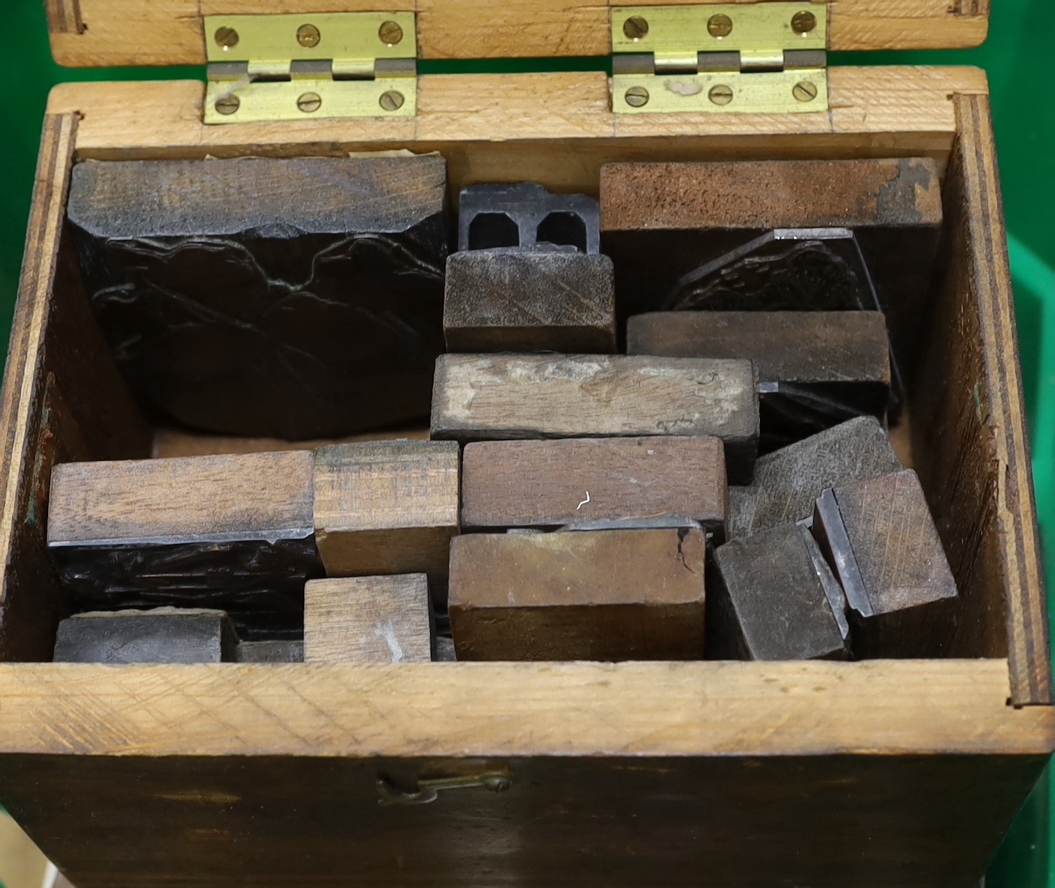 A collection of decorative metal printing blocks, mainly 20th century examples